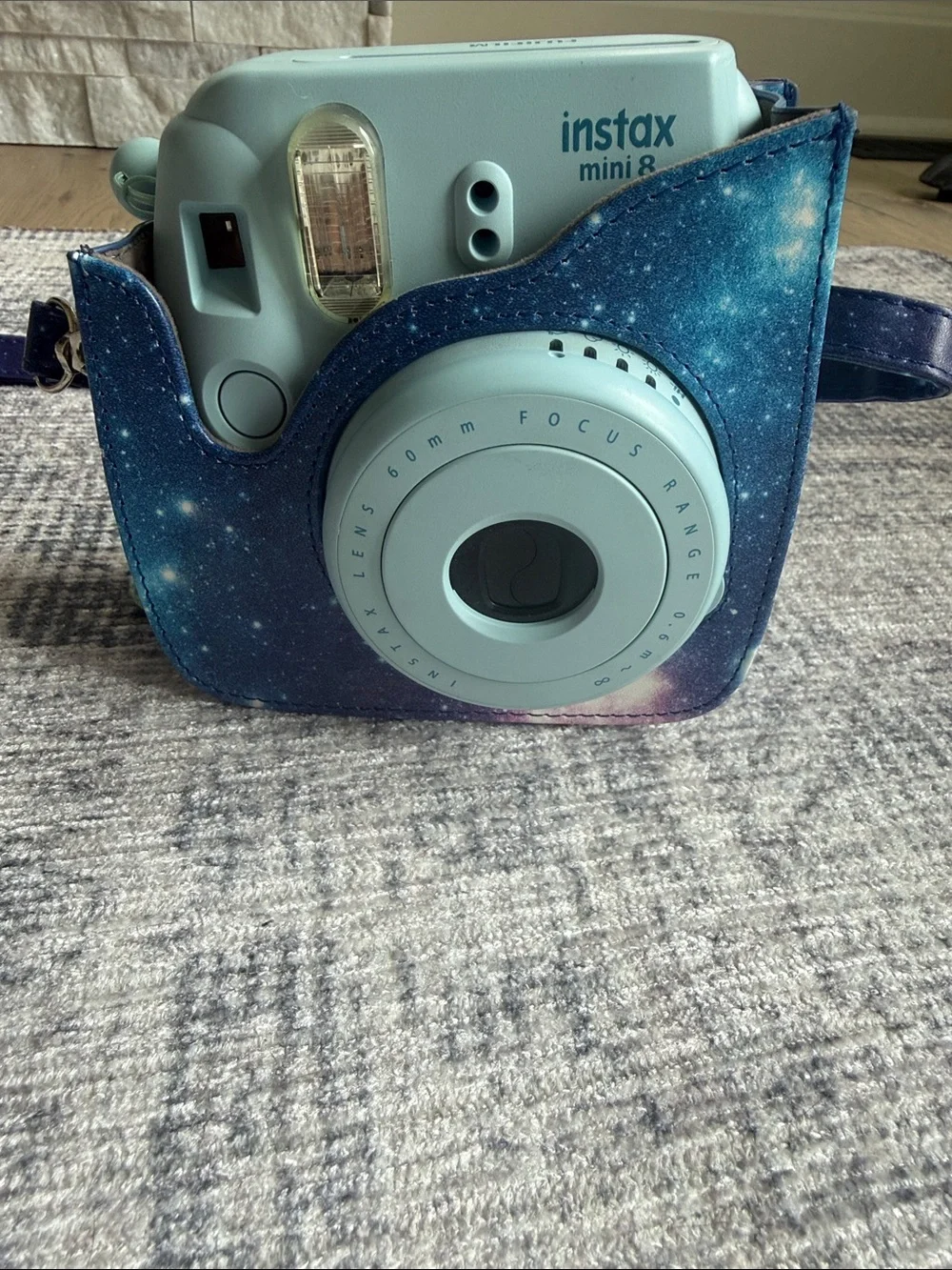 Fujifilm Instax Camera with Galaxy Blue Case and Strap